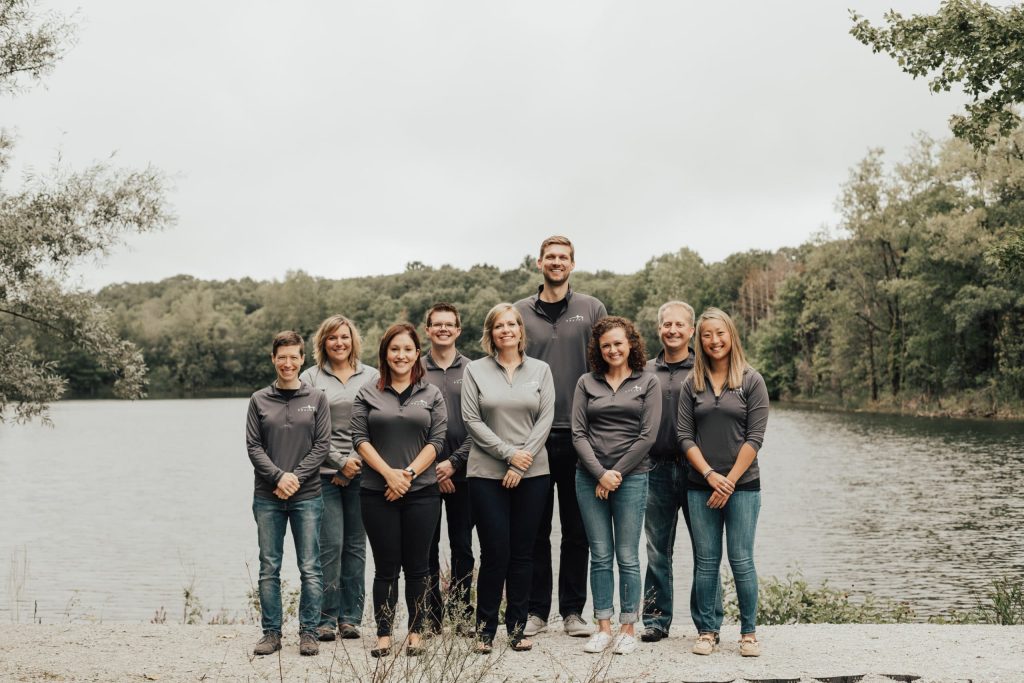 Brains team in front of pond