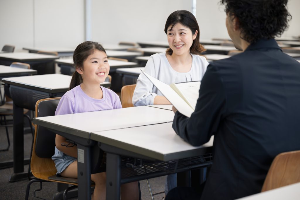 Mother and daughter being interviewed in an IEP meeting.